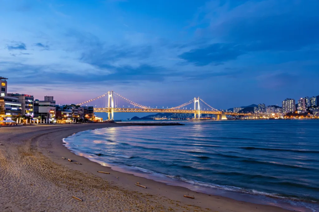 Gwangalli Beach and Gwangandaegyo Bridge at sunset in Busan, South Korea