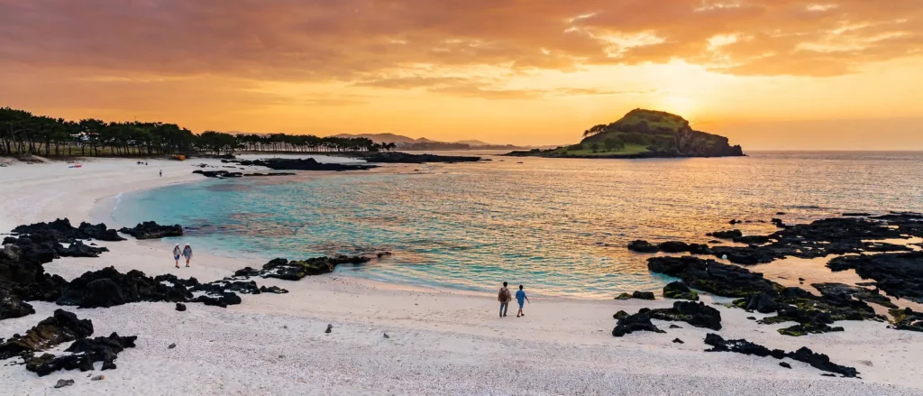 Hyeopjae Beach at sunset with Biyangdo Island just offshore, Jeju Island